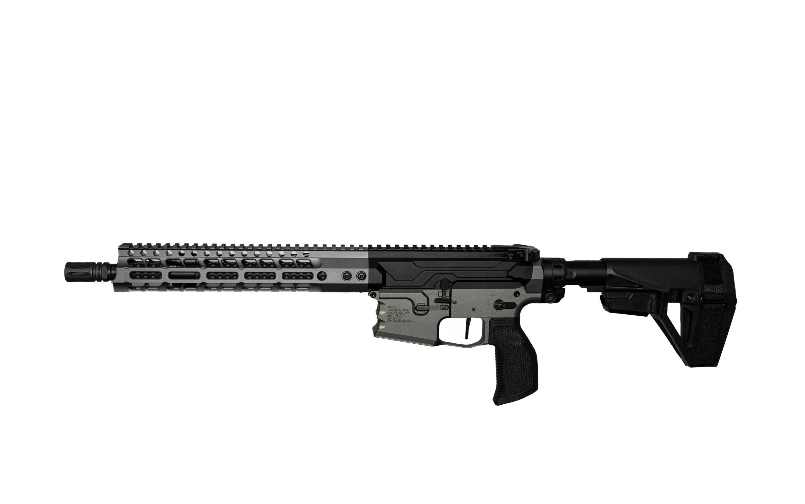 Side profile of a modern assault rifle with a long vented quad-rail handguard and adjustable stock suitable for tactical use.