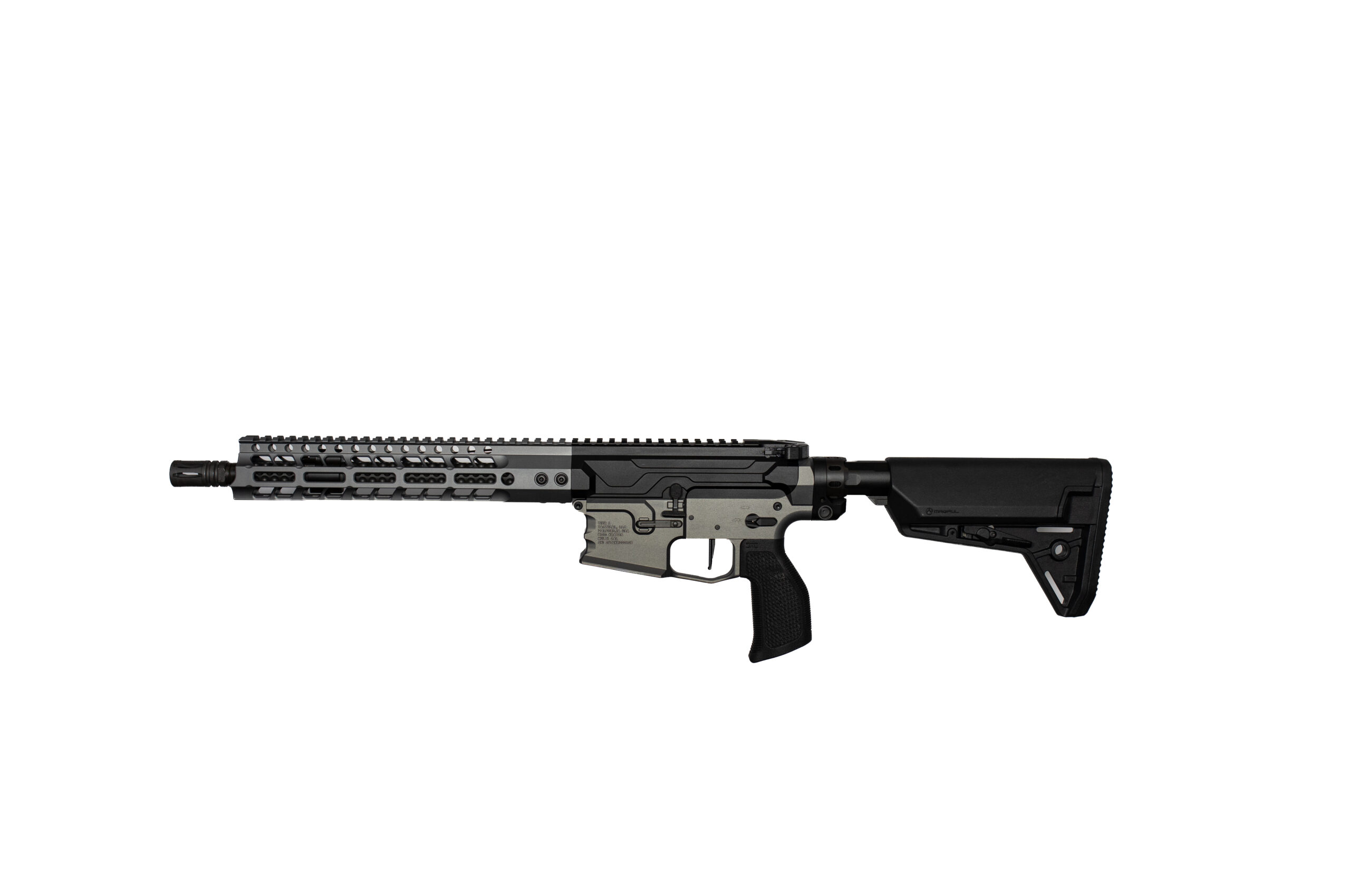 Modern assault rifle with a long rail, angled fore-end, and collapsible stock in black and tan colors laid horizontally against a white background