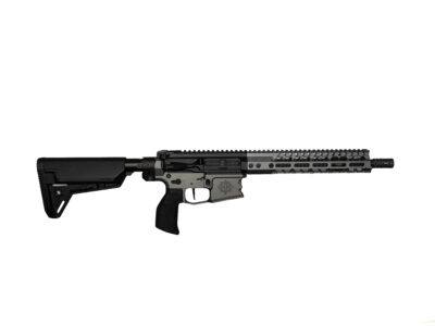 Profile view of a modern sporting rifle with a long rail system and collapsible stock on a white background, showing its upper receiver and barrel.