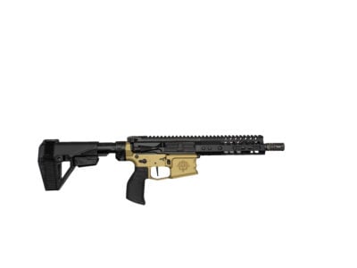 A modern tactical rifle with a black stock and a tan lower receiver, laying horizontally across the lower portion of the image, showing a long rail and grip area.