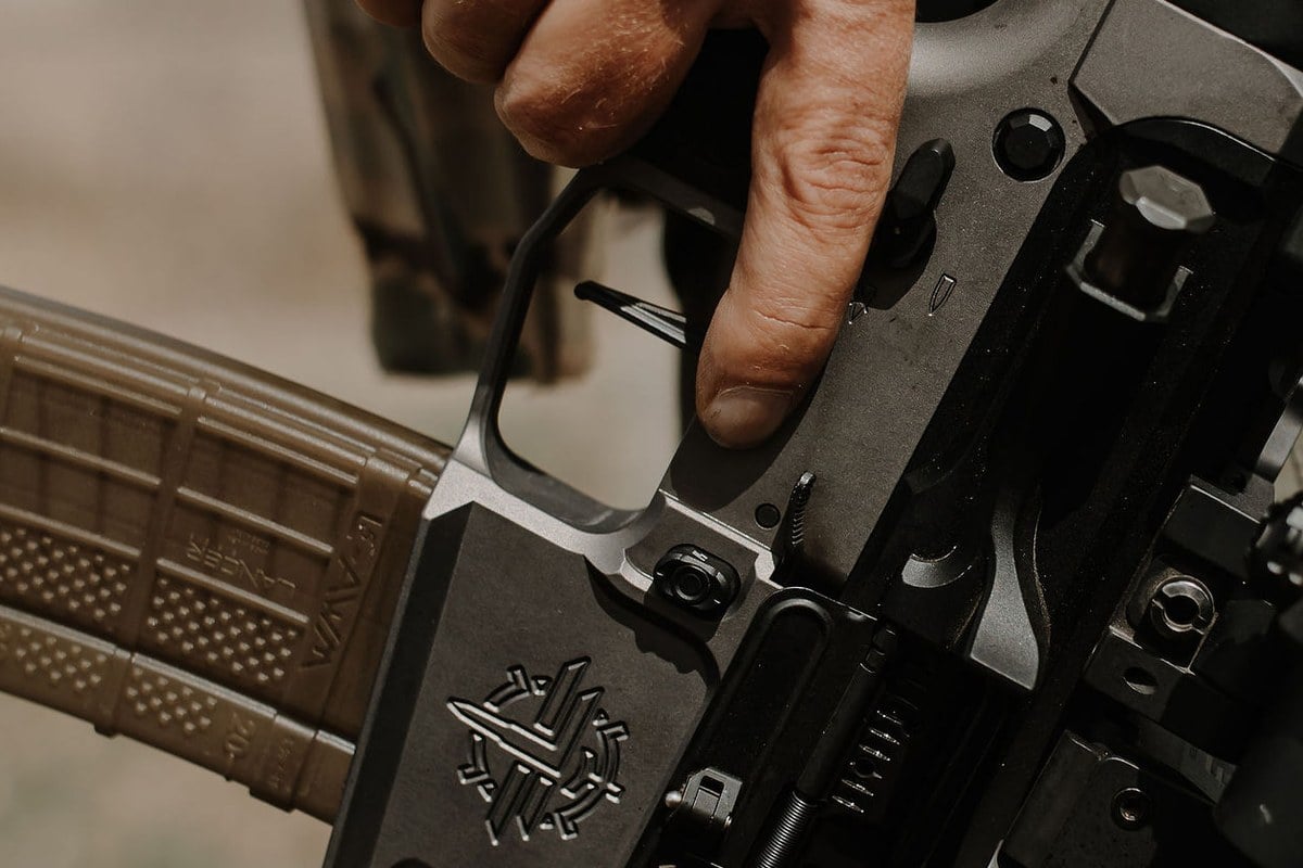 T1T flat trigger and engraved billet lower receiver with indexed finger