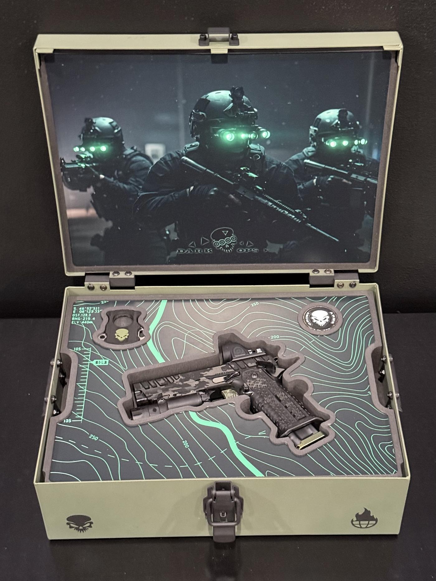 Ghost Arms Dark Ops box set open, Atlas Apollo v2 in cut foam over the printed topographic panel